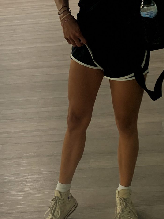 Arii's legs in 2024, before the block: thin quads with little separation.